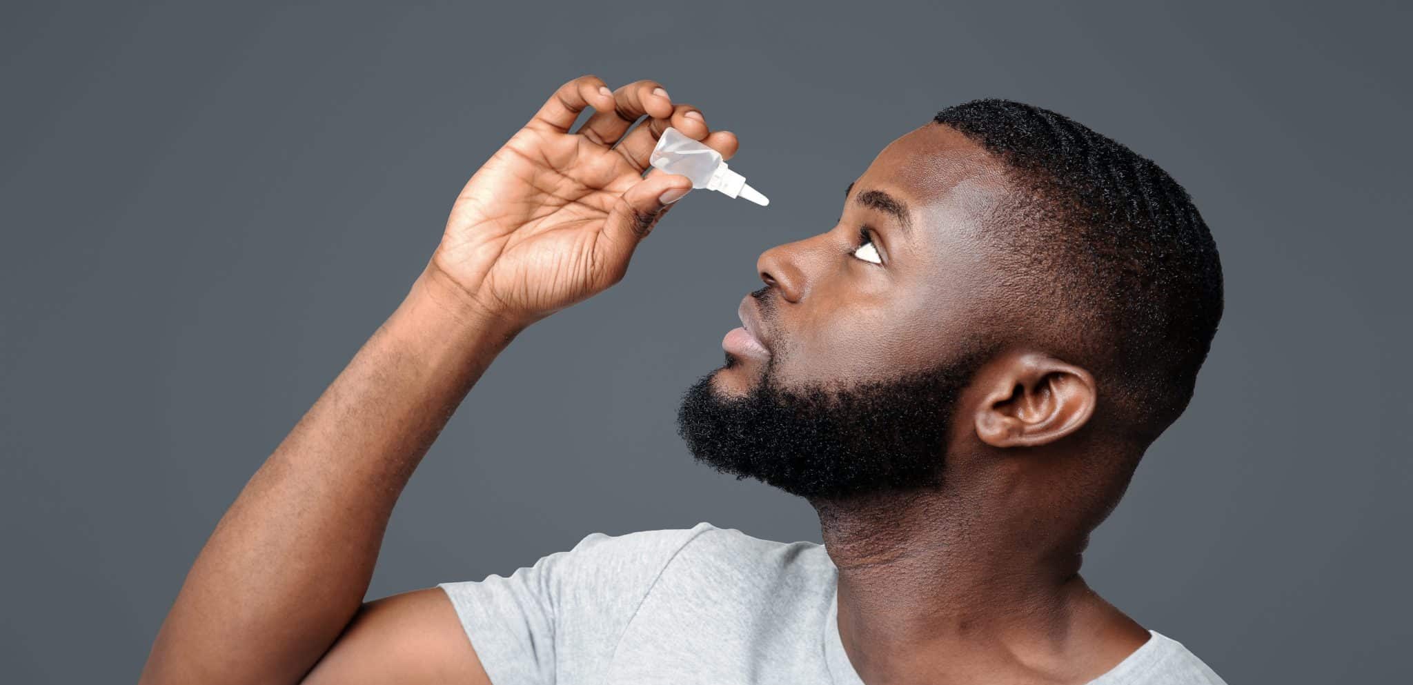 black,guy,applying,ophthalmology,eyedropper.,glaucoma,eye,prevention,,human,vision