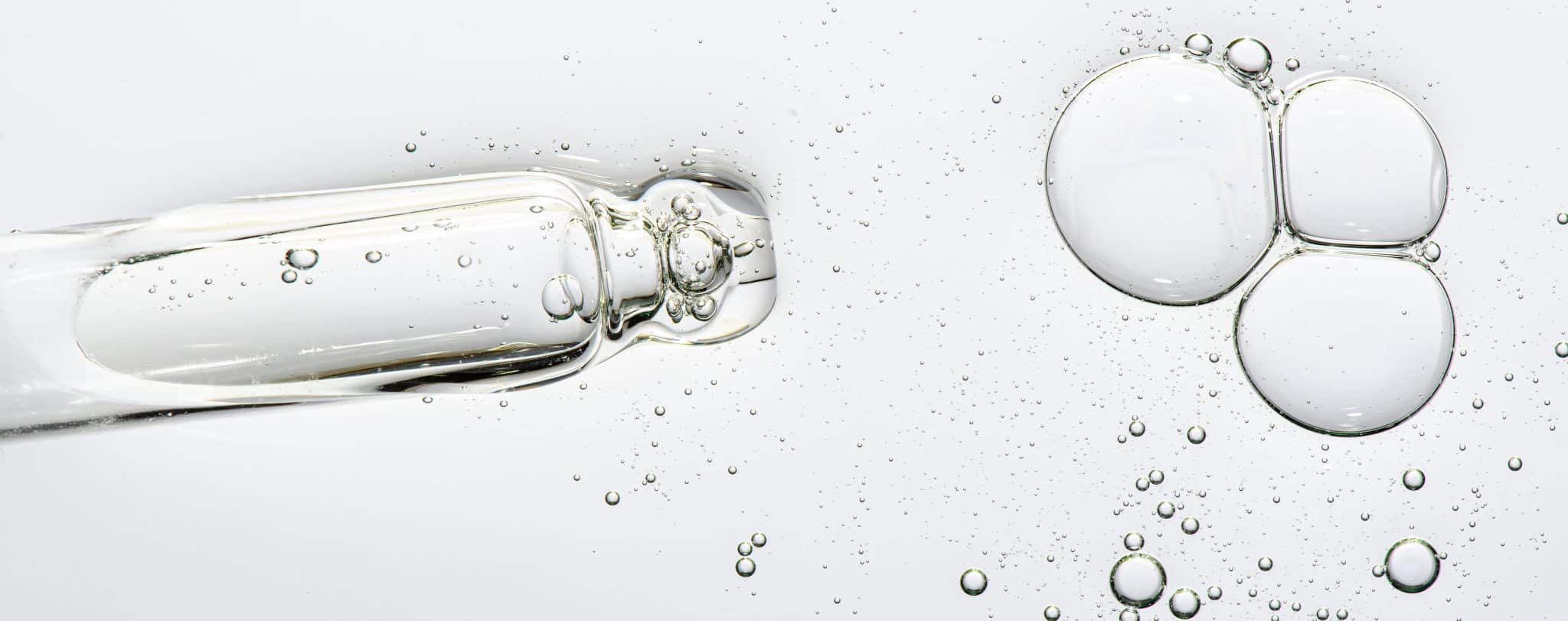 the,texture,of,a,cosmetic,serum,with,a,pipette,closeup.