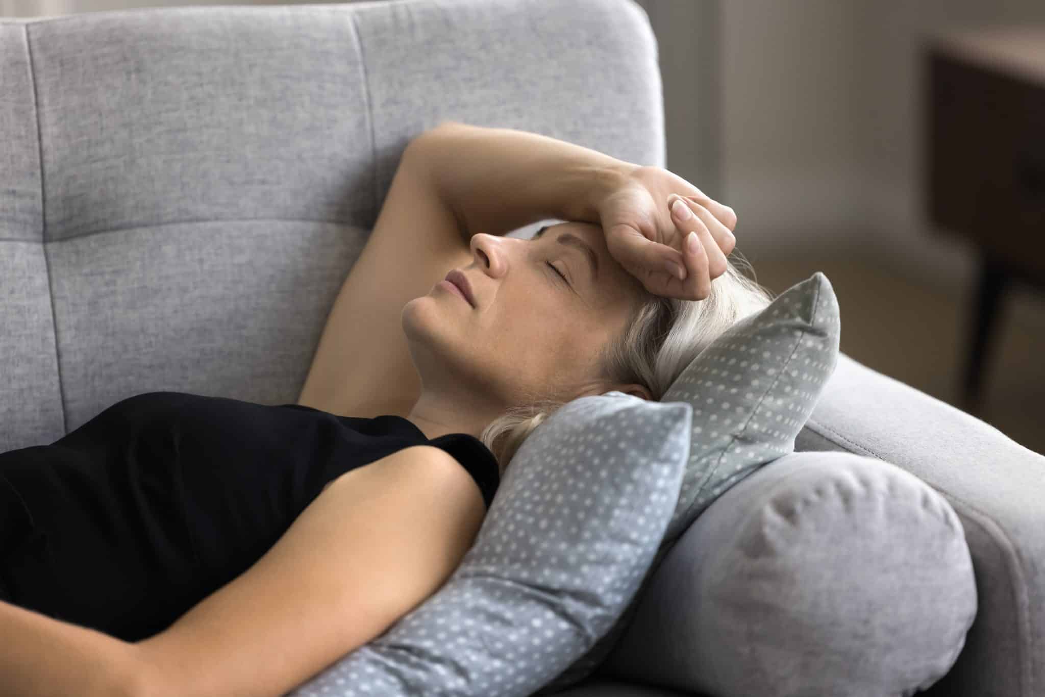 close,up,calm,mature,female,felt,asleep,lying,down,on